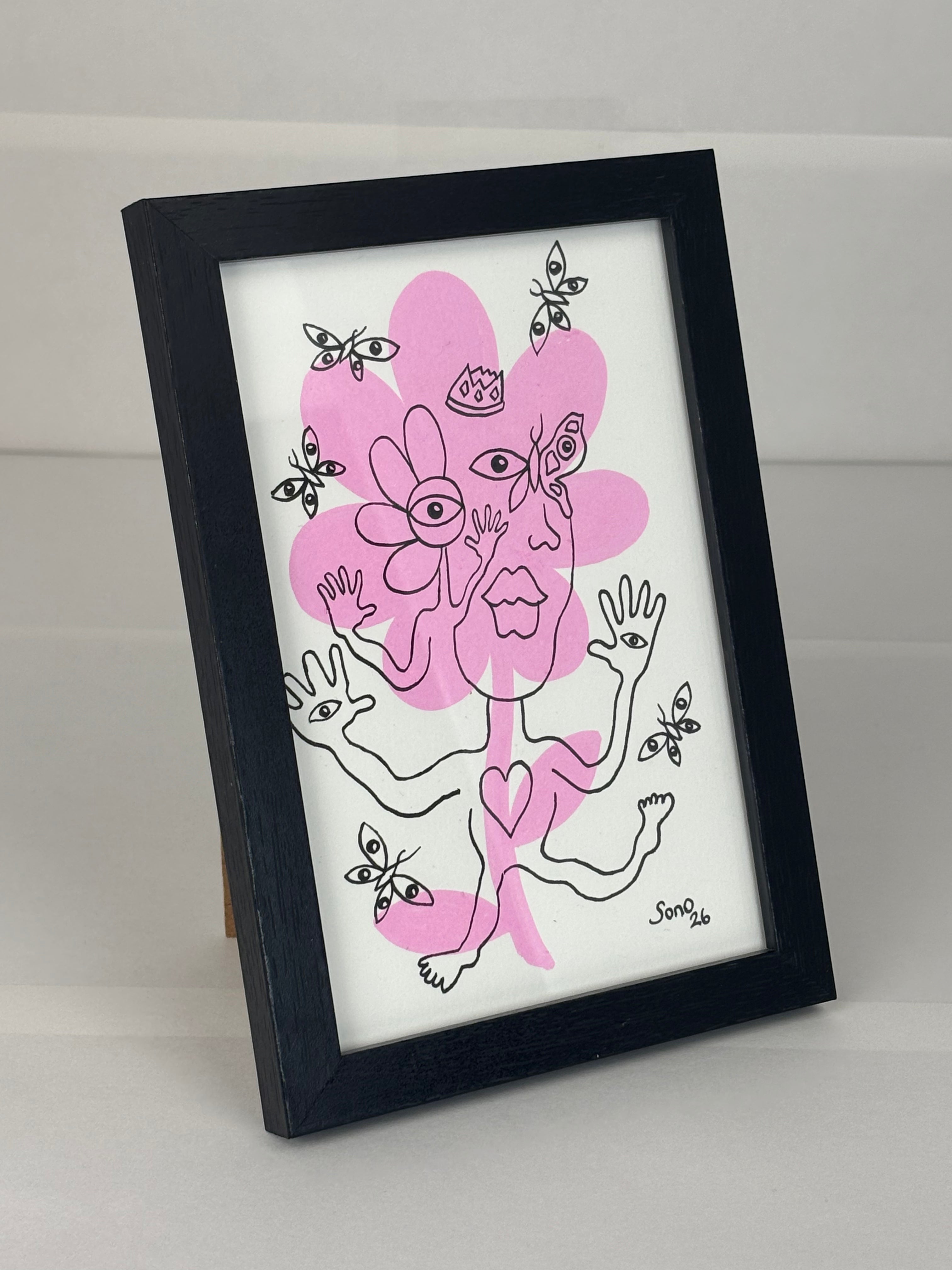 Le roi à la fleur rose