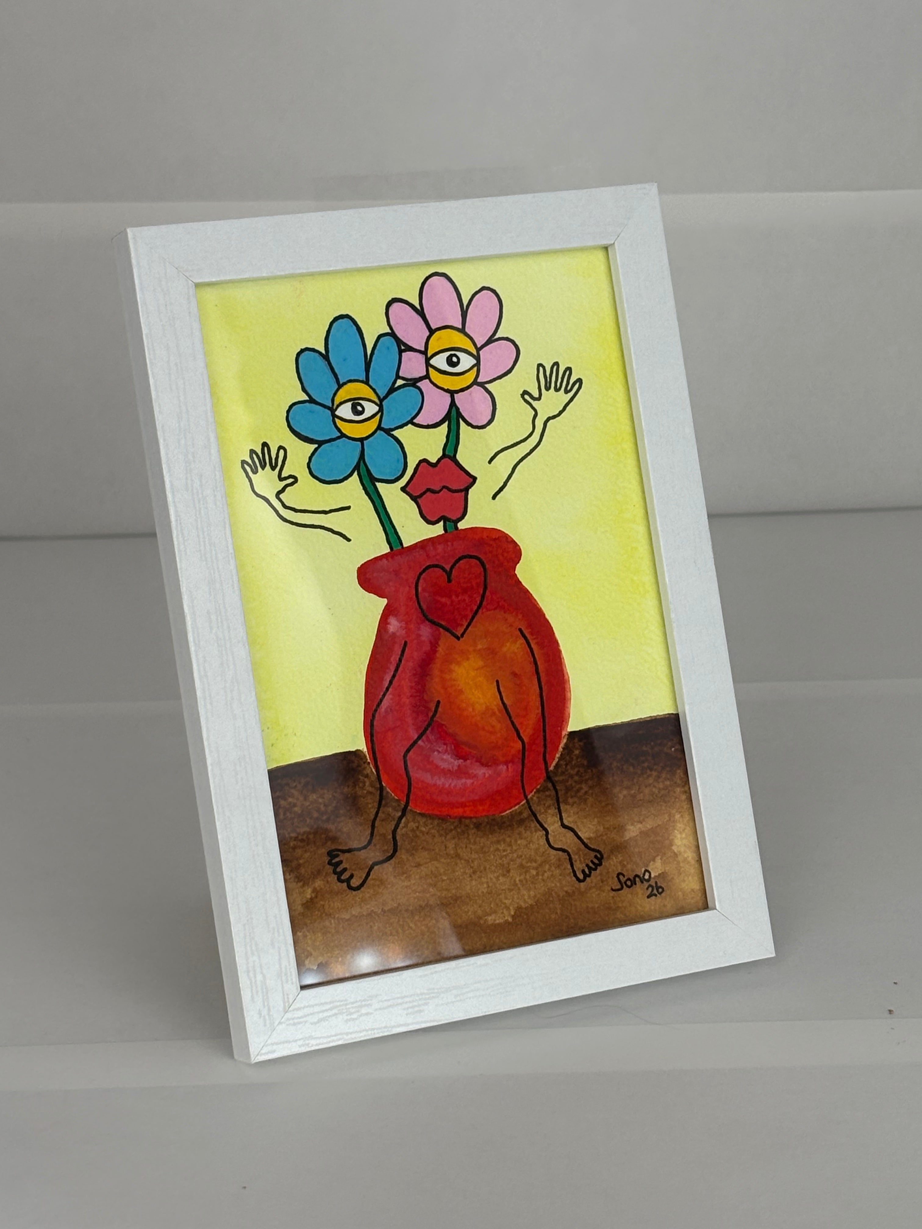 2 fleurs dans un vase d'amour